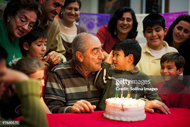 multi-generational hispanic birthday celebration - cuban ethnicity stock pictures, royalty-free photos & images