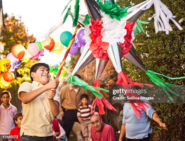 pinata mexican fiesta party game - old person with walking stick outside standing stock pictures, royalty-free photos & images