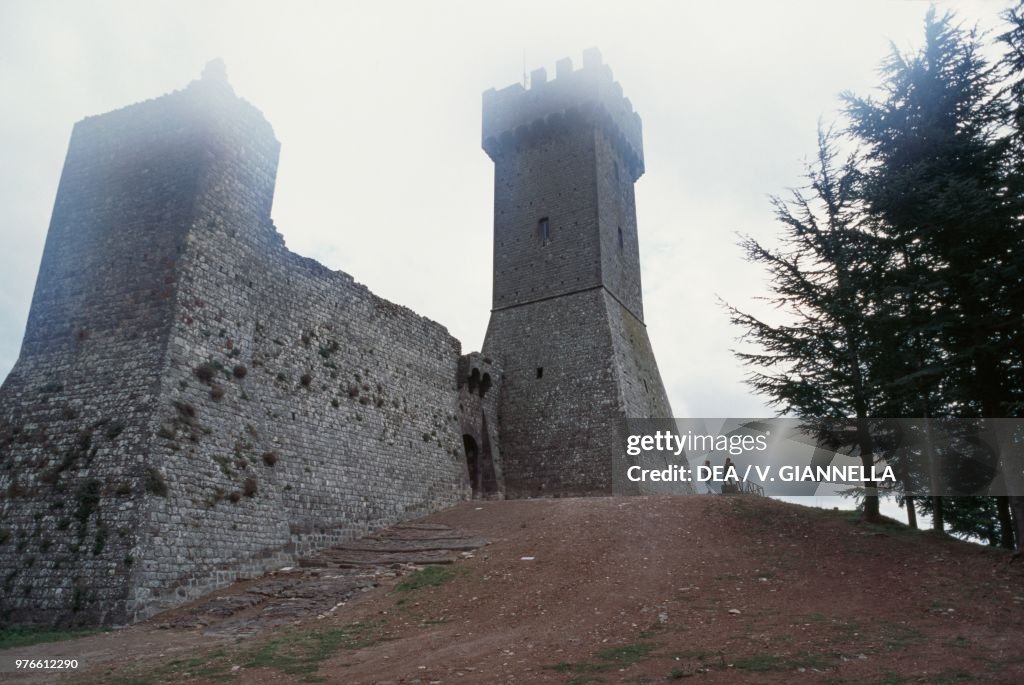 Radicofani castle surrounded by fog, Tuscany