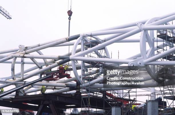 Wembley stadium-London: Inspecting welds on the interlacing steel tubes of the signature arch, constructed on the ground by Cleveland Bridge After...