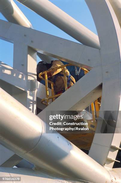 Wembley stadium-London: Inspecting welds on the interlacing steel tubes of the signature arch, constructed on the ground by Cleveland Bridge After...