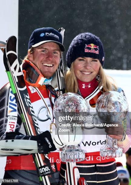 Ted Ligety of the USA takes the globe for the overall World Cup Giant slalom and Lindsey Vonn of the USA takes the globe for the overall world cup...