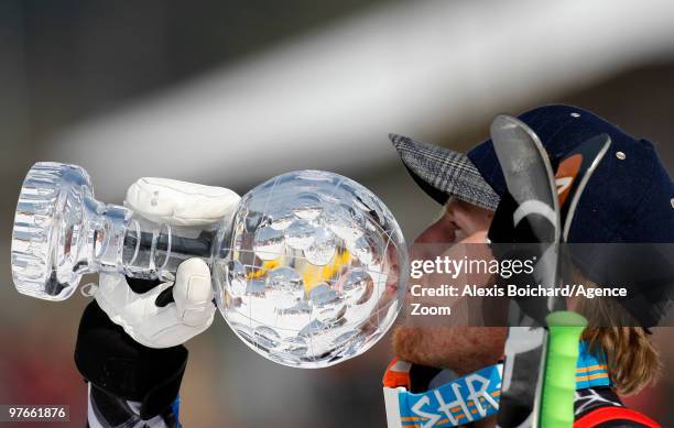 Ted Ligety of the USA takes the globe for the overall World Cup Giant slalom during the Audi FIS Alpine Ski World Cup Men's Giant Slalom on March 12,...