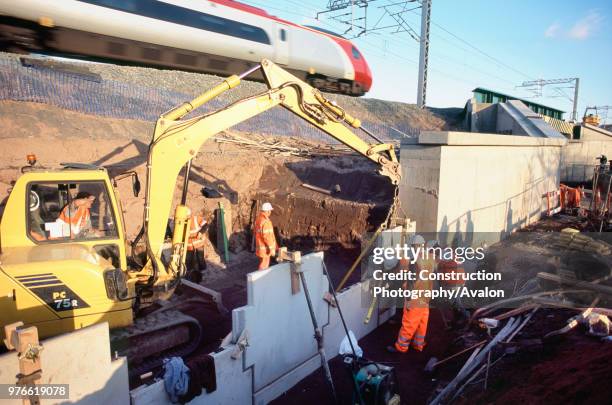 Fixing panels for the abutments of the centre rail overbridge across a local road on the West Coast Main Line, Lichfield bridges WCML.