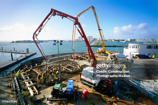 Concrete pour for foundation raft for a high rise apartment block, Spinnaker Tower in Portsmouth, UK .