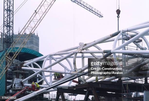 Wembley stadium-London: Interlacing steel tubes of the signature arch, constructed on the ground by Cleveland Bridge After lifting the 317 metres...