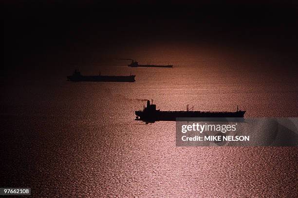 Ships line-up in safe anchorage 01 October 1987 near Dubai as attacks by both Iran and Iraq make passage through the Gulf a risky business. The...