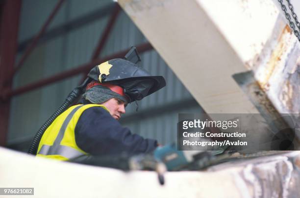 Wembley stadium-London: Inspecting welds on the interlacing steel tubes of the signature arch, constructed on the ground by Cleveland Bridge After...
