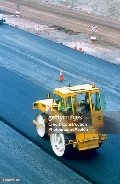 Asphalt being layed on a new road.