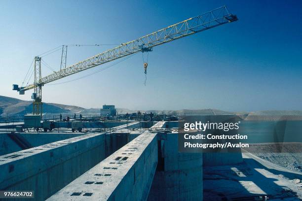 Ataturk dam under construction, Turkey Ataturk Dam - the world's fifth largest earth-and-rock fill dams - is the centerpiece of the 21 dams of the...
