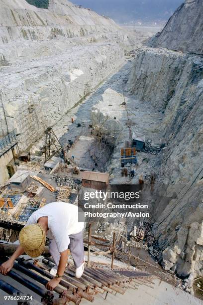 Rock excavation for ship channel Three Gorges Dam Yangtse River Sandouping, Yichang, Hubei Province, China Year 2000 .