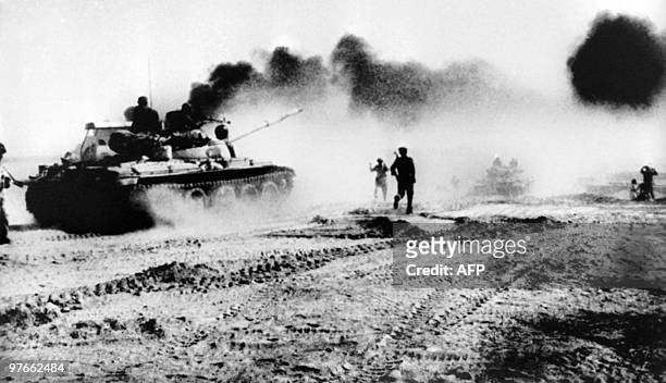 Picture released on October 22, 1980 of Iraqi troops riding in Soviet-made tanks trying to cross the karun river Northeast of Khorramshahr, in Iraq,...
