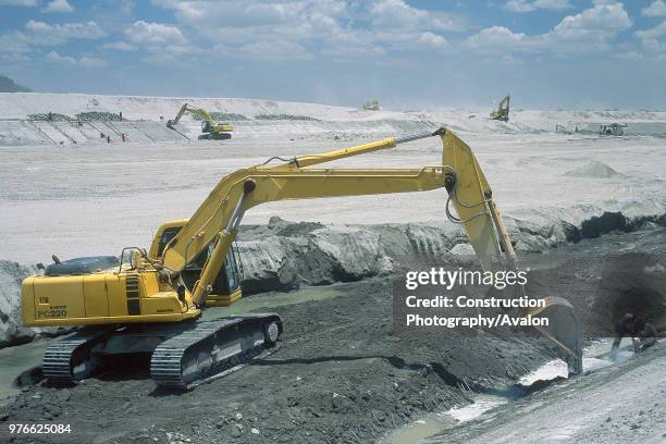 Komatsu PC220 excavator cleaning riverbeds after the catastrophic eruption in June 1991.