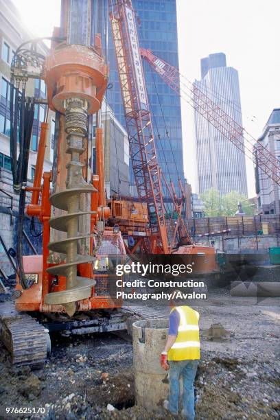 Circular piled foundations under installation for the Swiss Re Tower by Sir Norman Foster, now a London landmark London, United Kingdom .