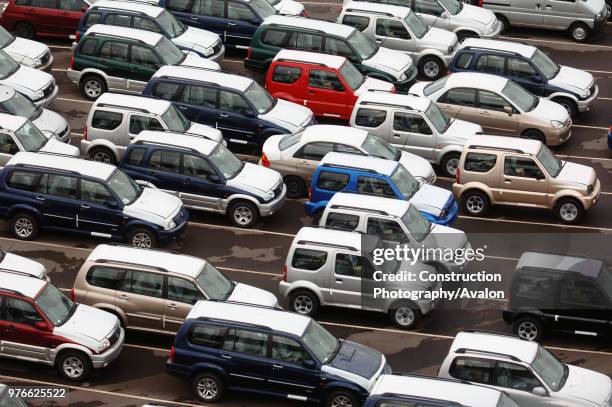 New Suzuki cars and vans parked at Avonmouth docks near Bristol, UK.