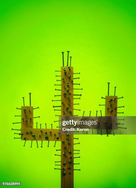 cactus made from screws - chiodo attrezzi da lavoro foto e immagini stock