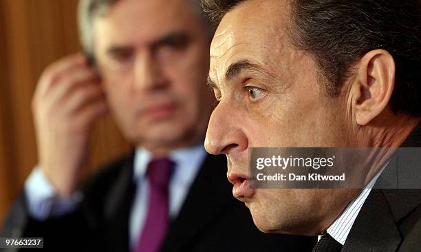 British Prime Minister Gordon Brown and French President Nicolas Sarkozy conduct a press conference inside 10 Downing Street on March 12, 2010 in...