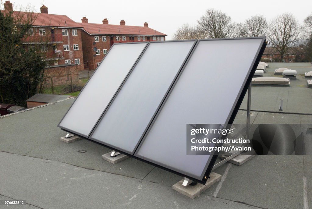 Hot water solar panels on a roof of a school, Ipswich, UK