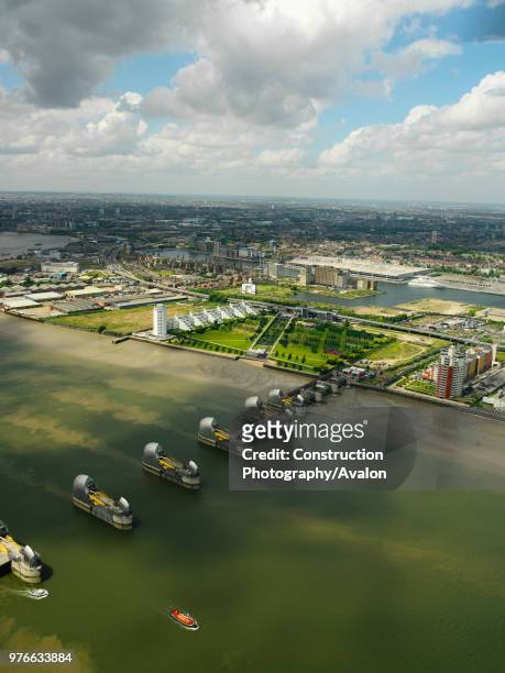 Aerial view of the Thames Barrier, ExCel Exhibition Centre on Royal Victoria Dock and Barrier Point, a landmark prestige housing development by...