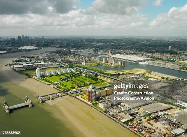 Aerial view of the Thames Barrier, ExCel Exhibition Centre on Royal Victoria Dock, Barrier Point, a landmark prestige housing development by Barratt,...