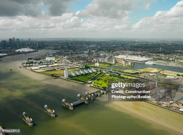 Aerial view of the Thames Barrier, ExCel Exhibition Centre on Royal Victoria Dock, Barrier Point, a landmark prestige housing development by Barratt,...