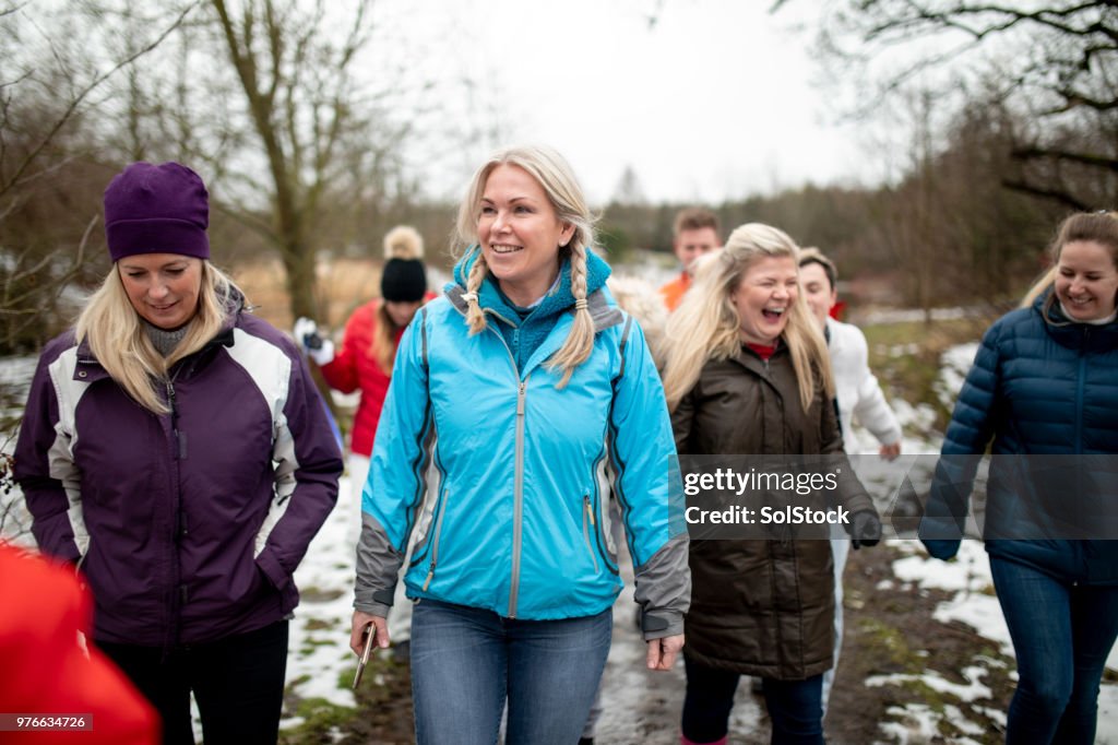 Work Colleagues Walking Through the Snow