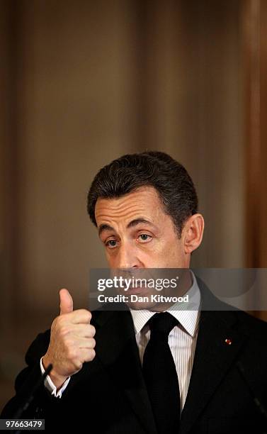 French President Nicolas Sarkozy reacts during a press conference with British Prime Minister Gordon Brown inside 10 Downing Street on March 12, 2010...