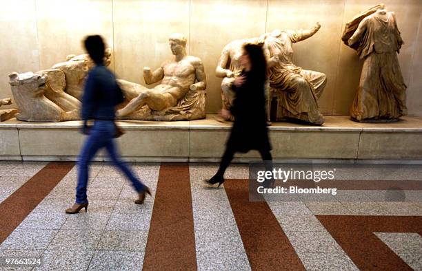 Replica statues from the Parthenon sit on display at the metro station in Athens, Greece, on Friday, March 12, 2010. European Union finance ministers...
