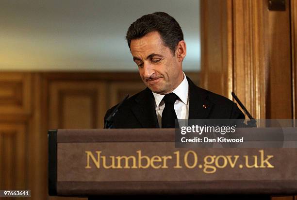 French President Nicolas Sarkozy reacts during a press conference with British Prime Minister Gordon Brown inside 10 Downing Street on March 12, 2010...