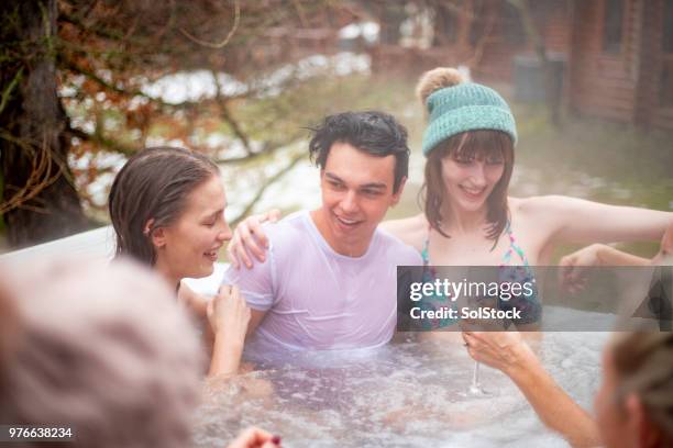 fun with colleagues in the hot tub - hot tub party stock pictures, royalty-free photos & images