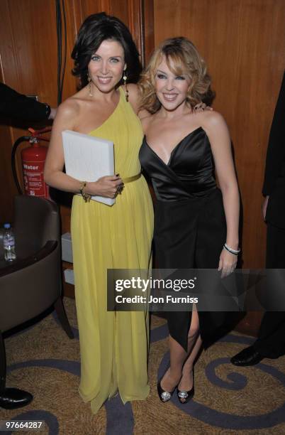 Kylie and Dannii Minogue poses in the winners room at the ELLE Style Awards at Grand Connaught Rooms on February 22, 2010 in London, England.