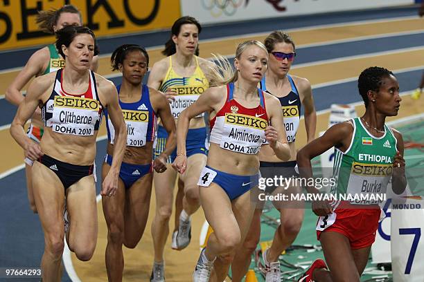 Ethiopia's Gelete Burka competes followed by Great Britain's Helen Clitheroe , Russia's Anna Alminova and other athletes during the women's first...