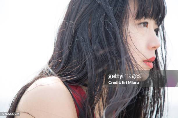 a black hair women with a profile - japanese woman stock-fotos und bilder
