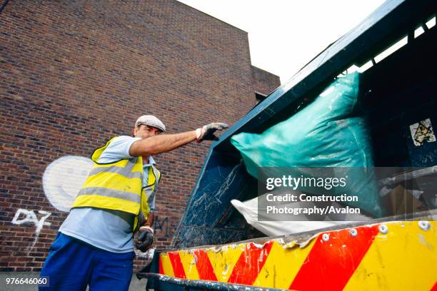 Dustmen working for the local council refuse collection service, Greenwich, London, UK.