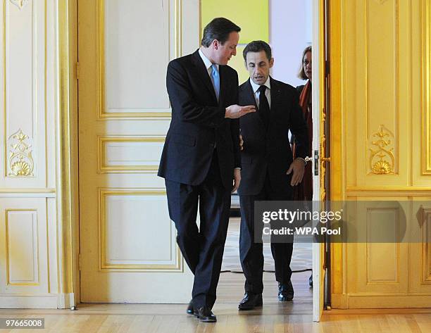 French President Nicolas Sarkozy meets with Conservative Party leader David Cameron at the French Ambassador's Residence, on March 12, 2010 in...