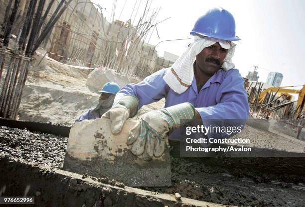 Construction worker at World Trade Center Residence, Dubai, United Arab Emirates, December 18, 2005.