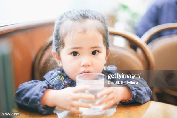 mother and daughter - chiba unease stock pictures, royalty-free photos & images