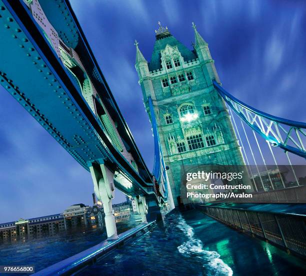 River Thames spilling on to Tower Bridge, London, UK .