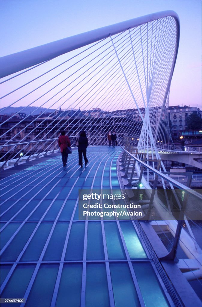 Zubizuri footbridge over the Nervion river, Bilbao, Spain. Access to Guggehheim Museum. Bridge designed by Santiago Calatrava.