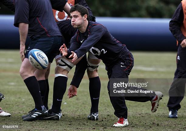 Scrumhalf Danny Care passes the ball during the England rugby union squad training session at Pennyhill Park on March 12, 2010 in Bagshot, England.