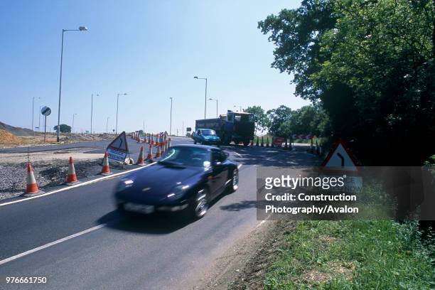 Traffic negotiating traffic management during construction of Great Leighs bypass, Essex, United Kingdom,.