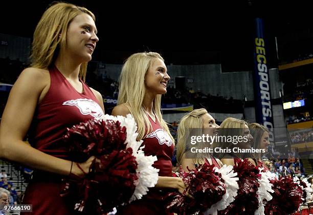 Cheerleaders for the Arkanasas Razorbacks support their school against the Georgia Bulldogs during the first round of the SEC Men's Basketball...