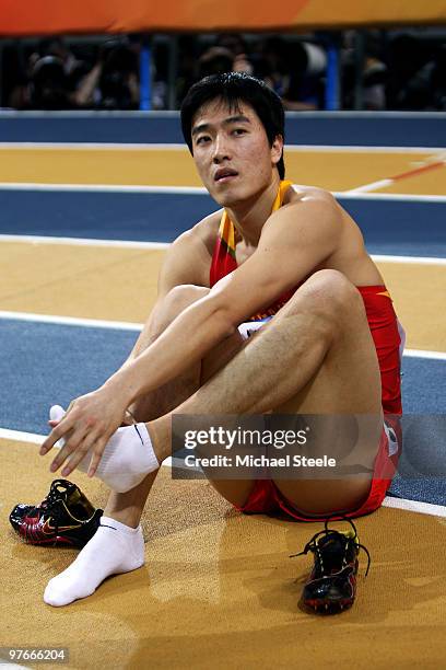 Xiang Liu of China competes in the mens 60m hurdle heats during Day 1 of the IAAF World Indoor Championships at the Aspire Dome on March 12, 2010 in...