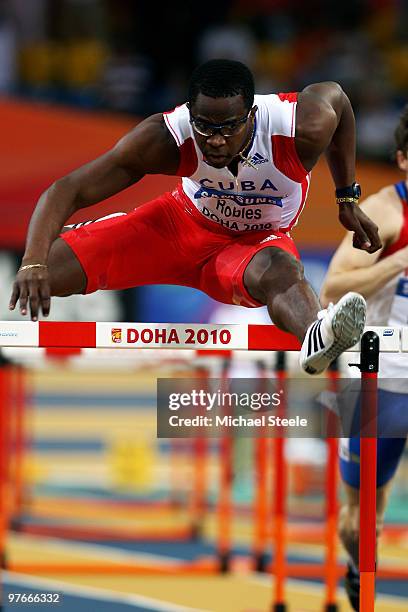 Dayron Robles of Cuba competes in the mens 60m hurdle heats during Day 1 of the IAAF World Indoor Championships at the Aspire Dome on March 12, 2010...