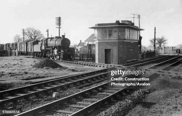 Murrow was located on the GER/GN joint line from Lincoln to March. In this scene, looking north, it is crossed by the M&GN route and the Down goods,...