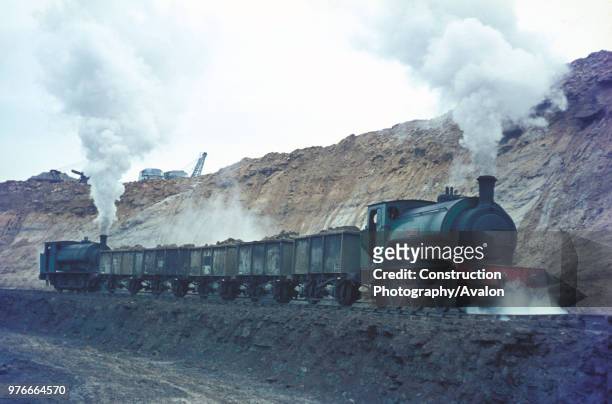 Nassington Ironstone Mine's two Hunslet 16 0-6-0STs, Jacks Green and Ring Haw, thread a loaded train through the Gullet. 1970.