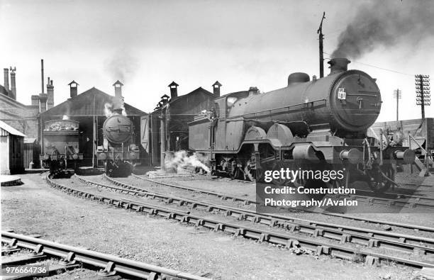 Newhaven shed on 12th July 1947. IN pride of place is No.2037 Selsey Bill, one of the classic Marsh LBSCR, H1 Class 4-4-2 Atlantics. This shed had...