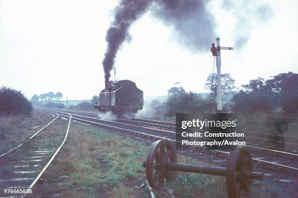 Philadelphia Colliery 0-6-2T No.31, built by Kitson of Leeds, runs back light engine to the shed. Caught passing Shiney Row box in poor light on the...