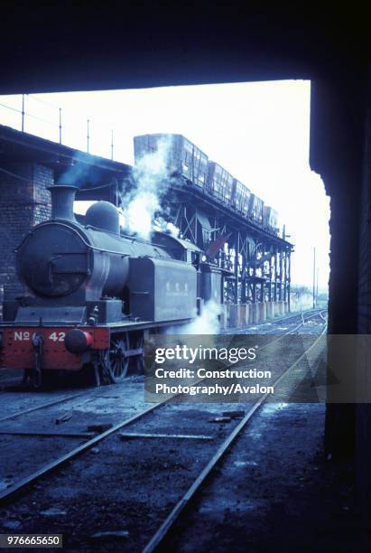 Philadelphia Colliery yard, County Durham on Friday 22nd September 1967 with Robert Stephenson & Hawthorn 0-6-2T No.42 of 1909 against the loading...