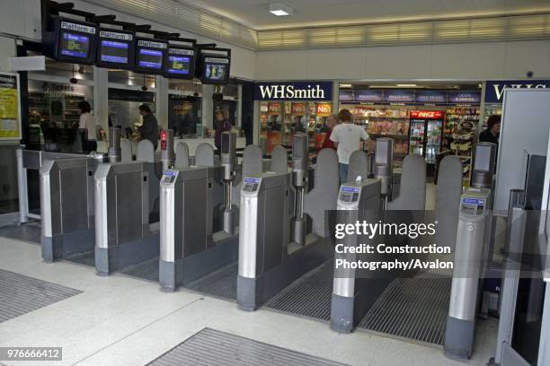 The booking hall at St Albans City station, Hertfordshire, with automated ticket barriers in the foreground 3rd May 2007.